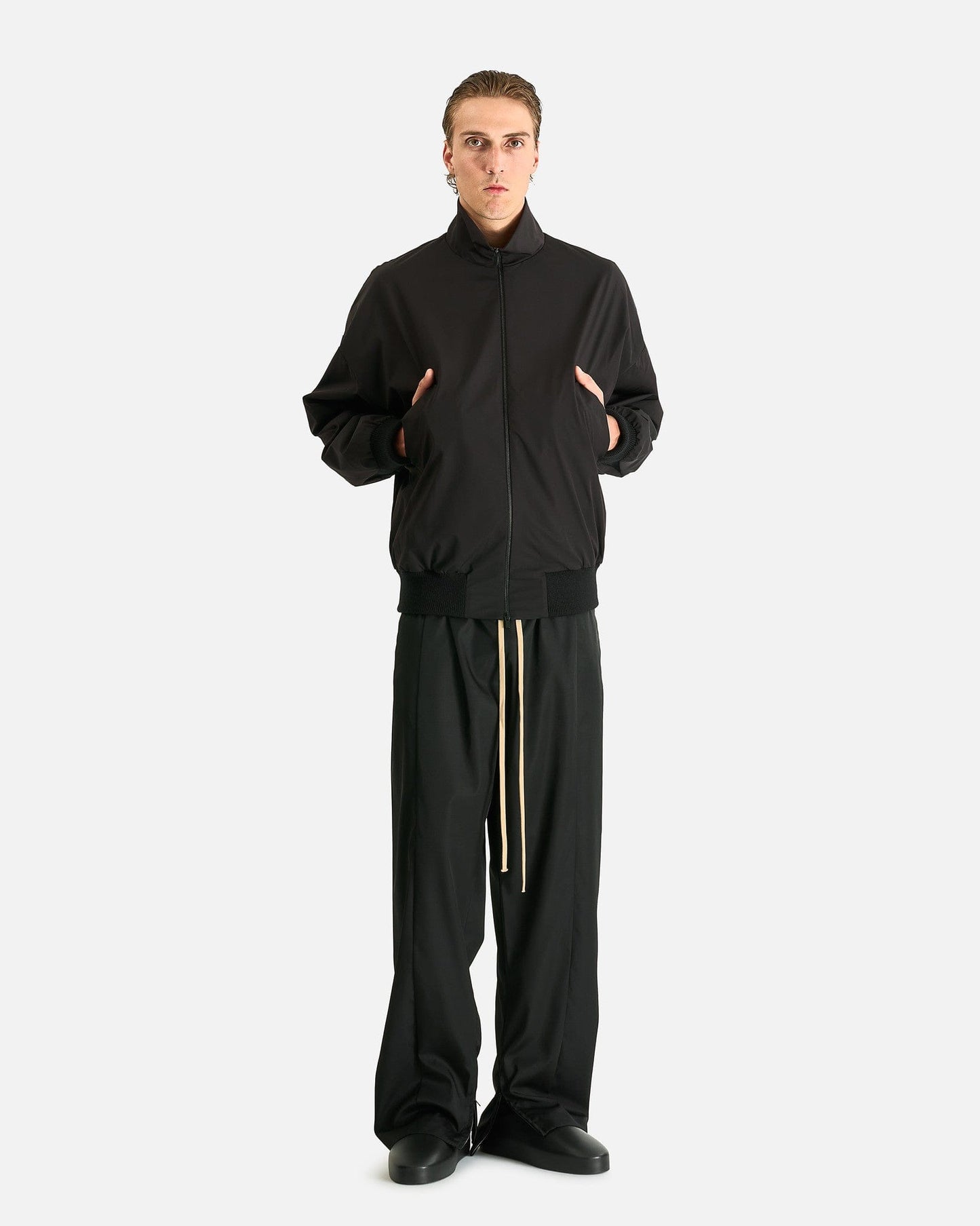 Fear of God Men's Pants Center Seam Track Pant in Black