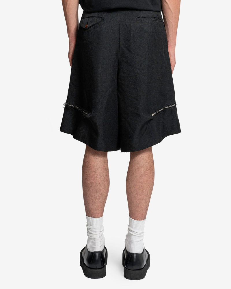 BLACK Comme des Garçons Men's Pants Distressed Zip-Detail Short Pants in Black