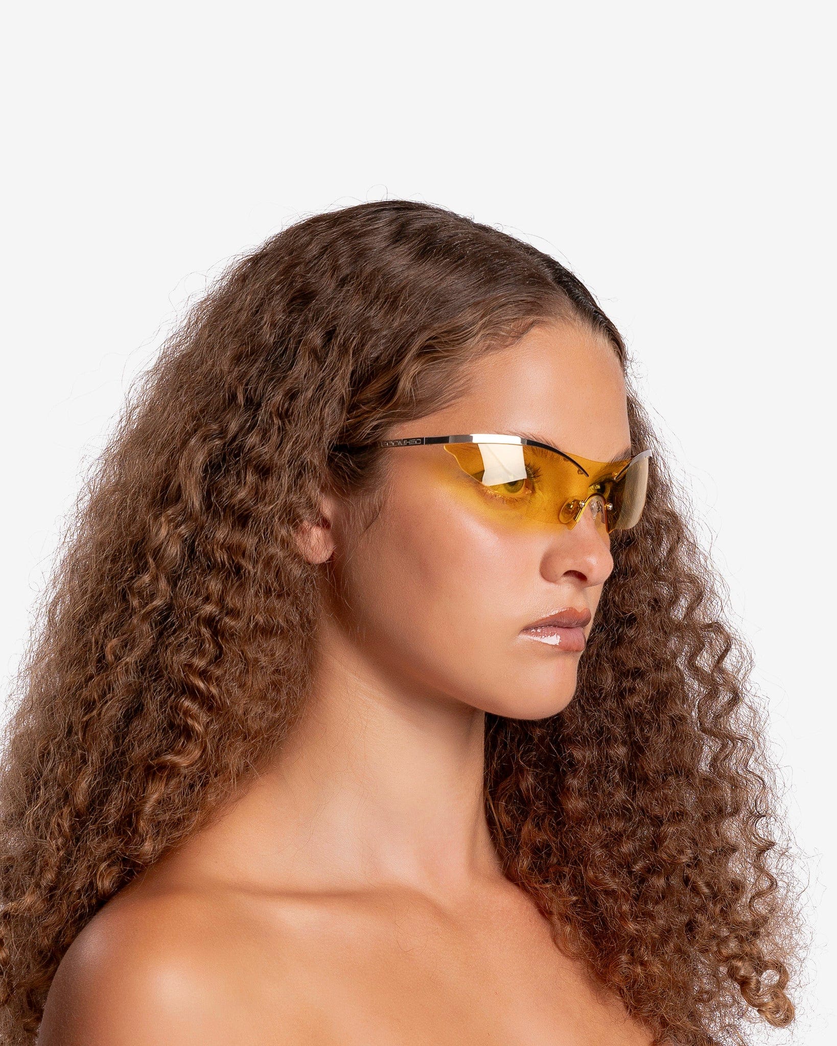 Goomheo Eyewear GOOMISWATCHINGYOU Sunglasses in Silver Frame/Yellow Lenses