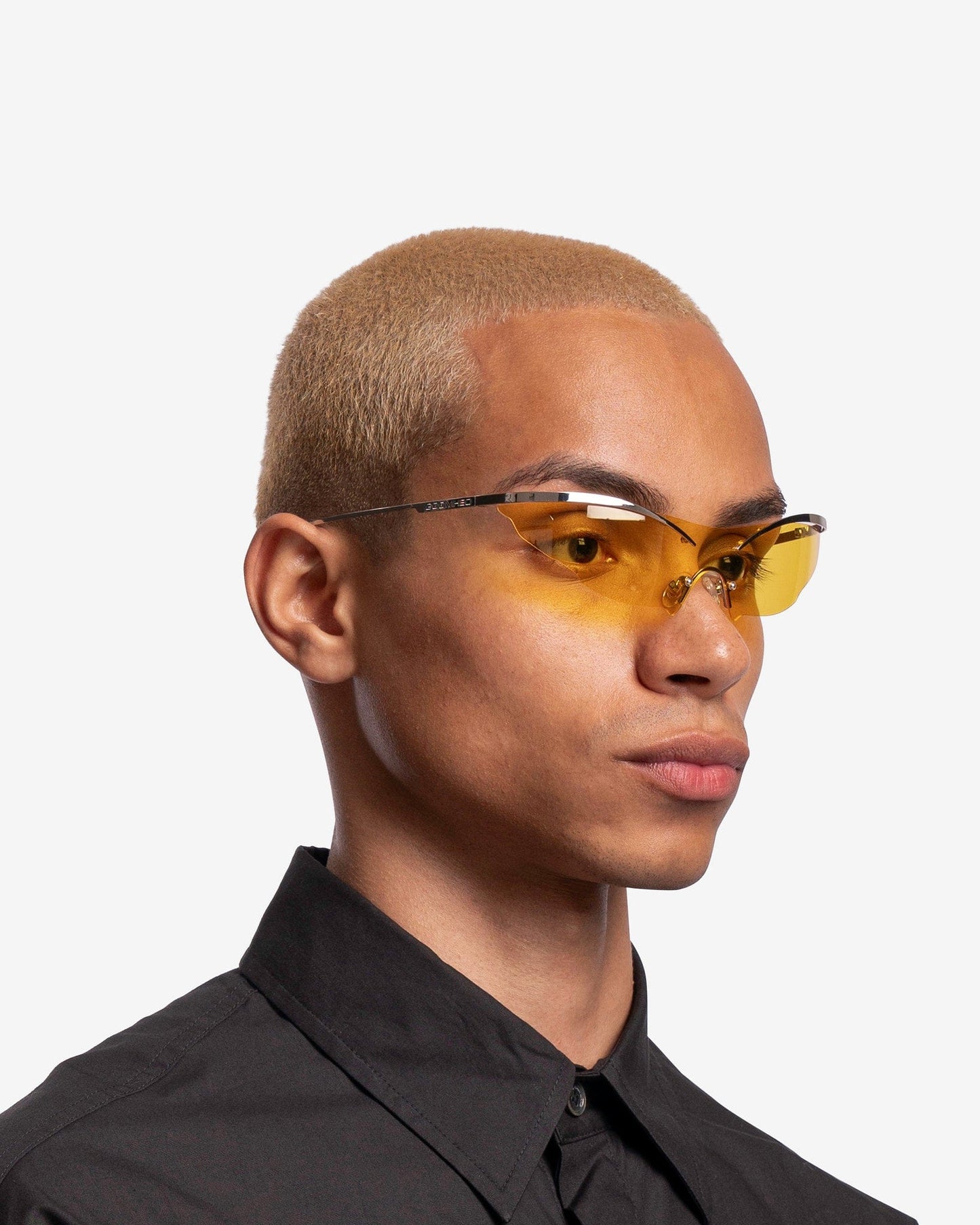 Goomheo Eyewear GOOMISWATCHINGYOU Sunglasses in Silver Frame/Yellow Lenses