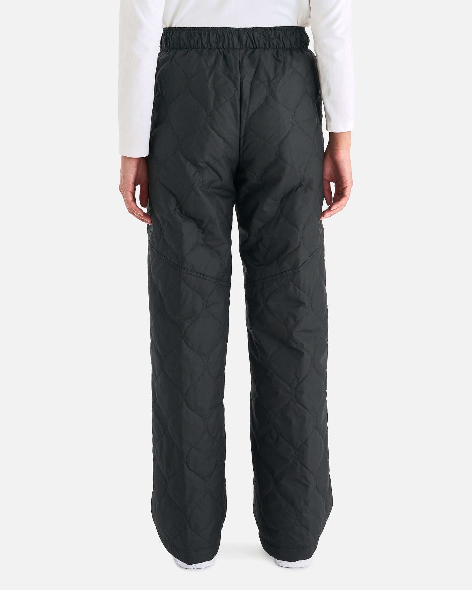 https://www.svrn.com/cdn/shop/files/high-waisted-open-hem-quilted-trousers-in-black-women-pants-nike-svrn-chicago-30563511271497.jpg?v=1701280560&width=1946