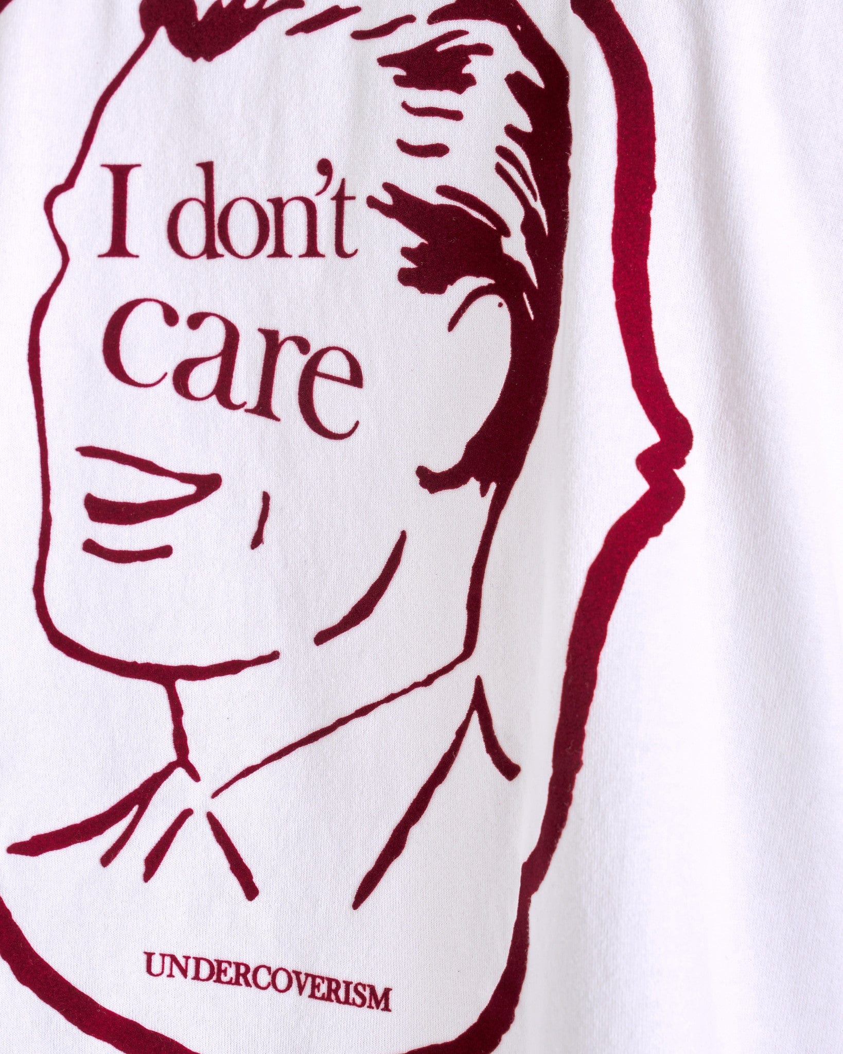 UNDERCOVER Men's T-Shirts 'I Don't Care' Graphic T-Shirt in White