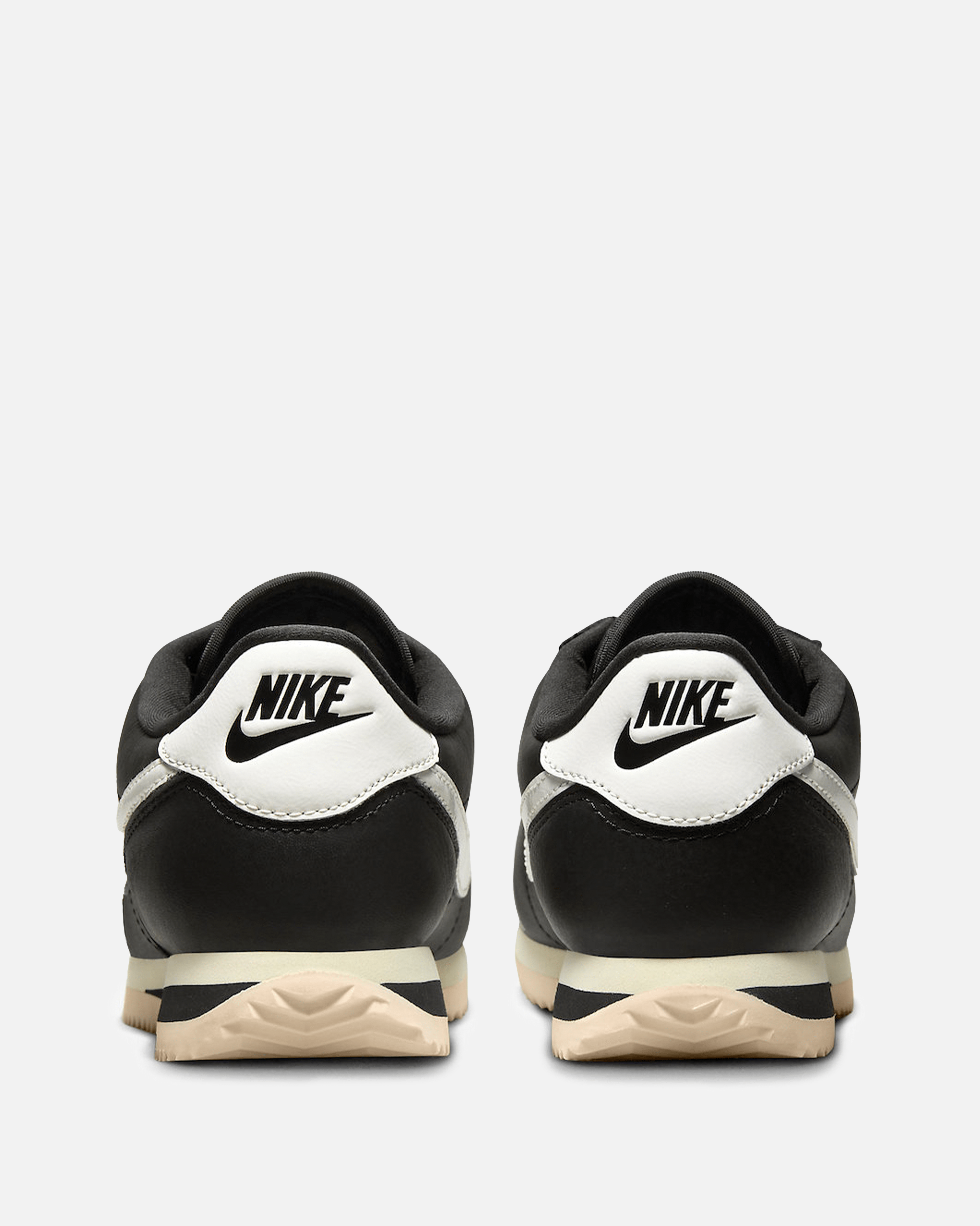womens black and white nike cortez