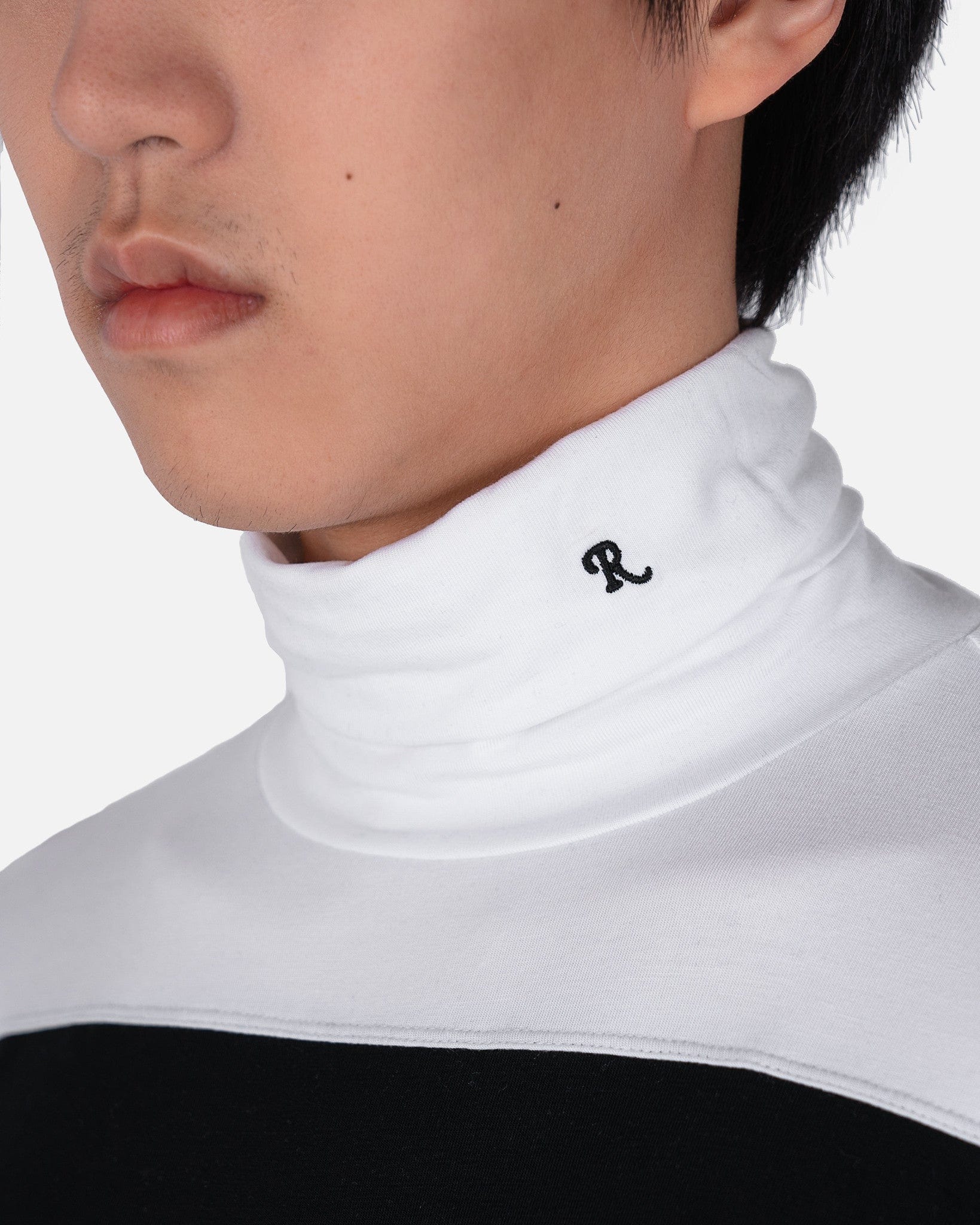 Raf Simons Mens Sweater Bicolor Turtle with R Embroidery in Black/White