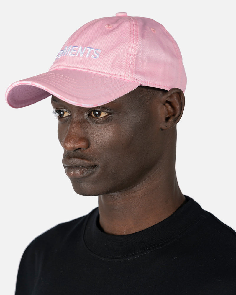 VETEMENTS Men's Hats Iconic Logo Cap in Baby Pink