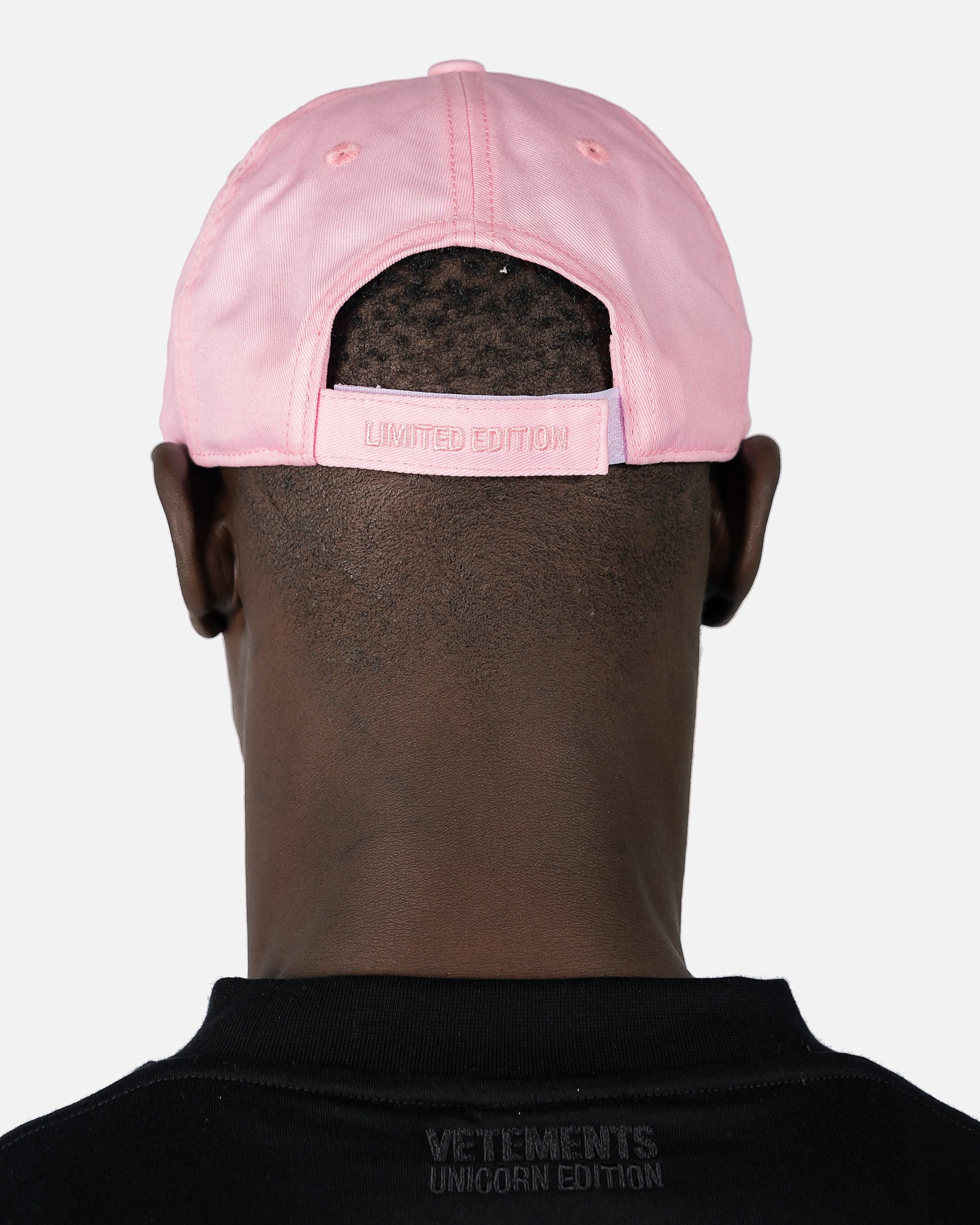 VETEMENTS Men's Hats Iconic Logo Cap in Baby Pink