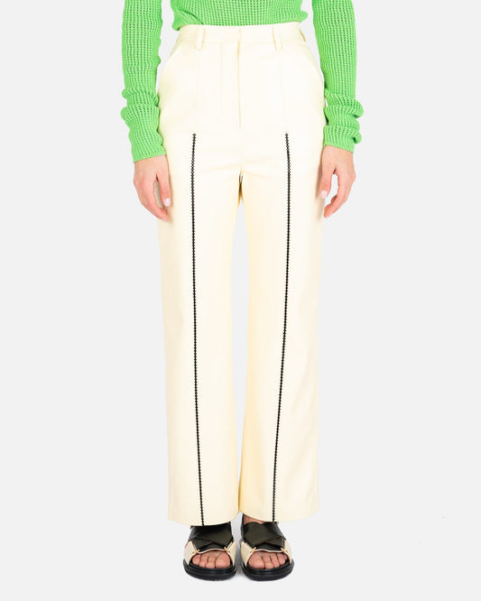 Nanushka Women Pants Lucee Vegan Leather Merrow-Stitch Straight Leg Trousers in Vanilla