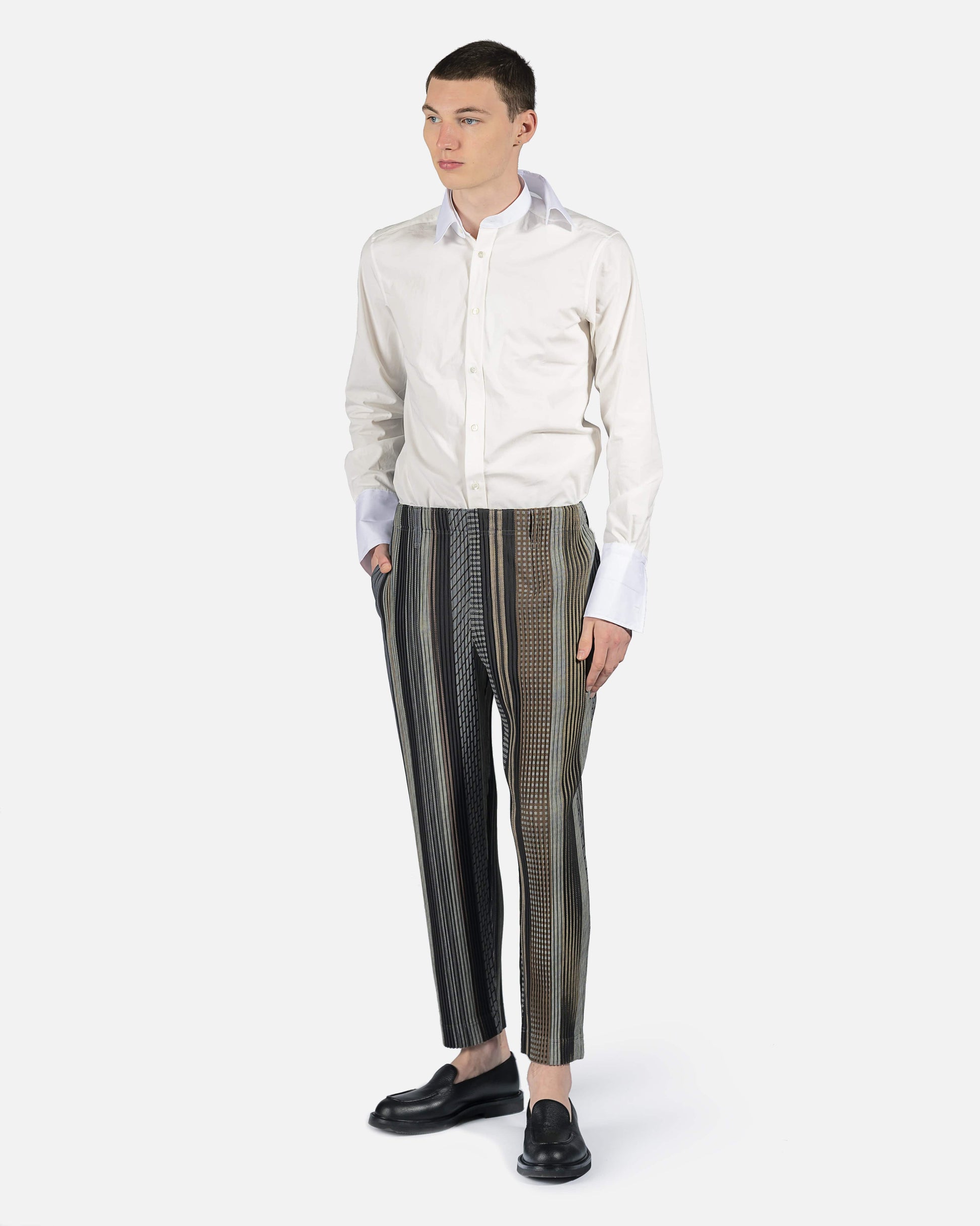 Homme Plissé Issey Miyake Men's Pants Woven Structure Trousers in Brown